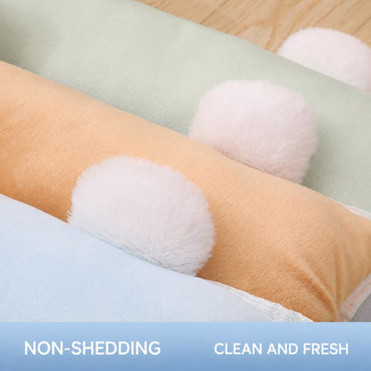 Pom-pom pillow detail