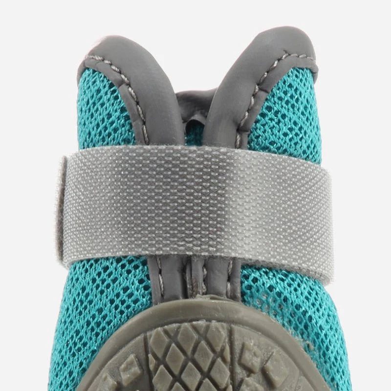 Bottom view of rugged rubber sole with deep grip pattern on Mesh Outdoor Doxie Boots