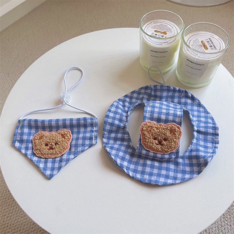 Blue plaid dachshund sun hat and bandana set flat lay