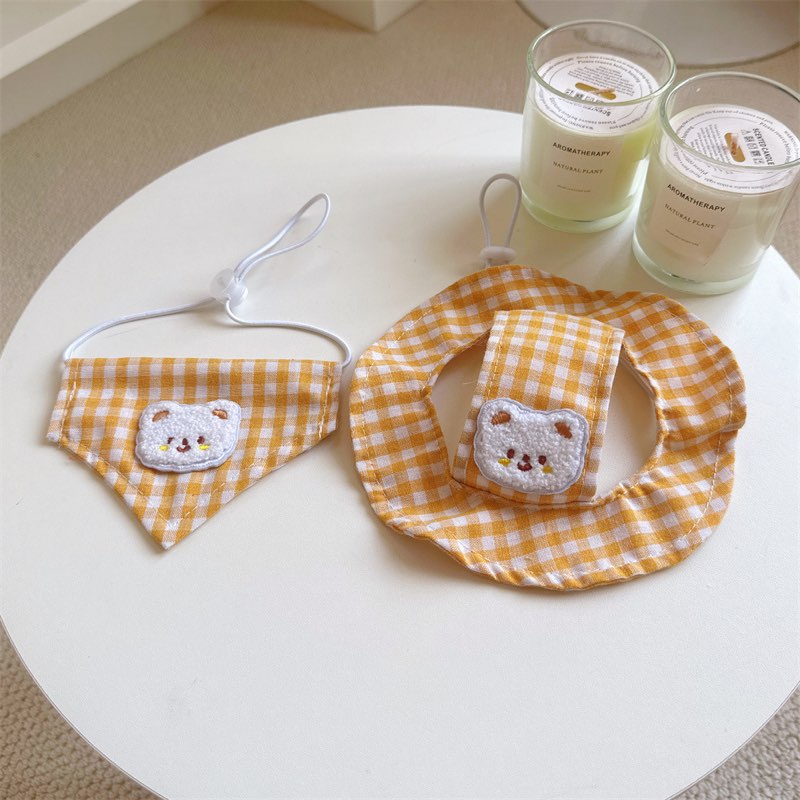 Yellow plaid dachshund sun hat and bandana set flat lay